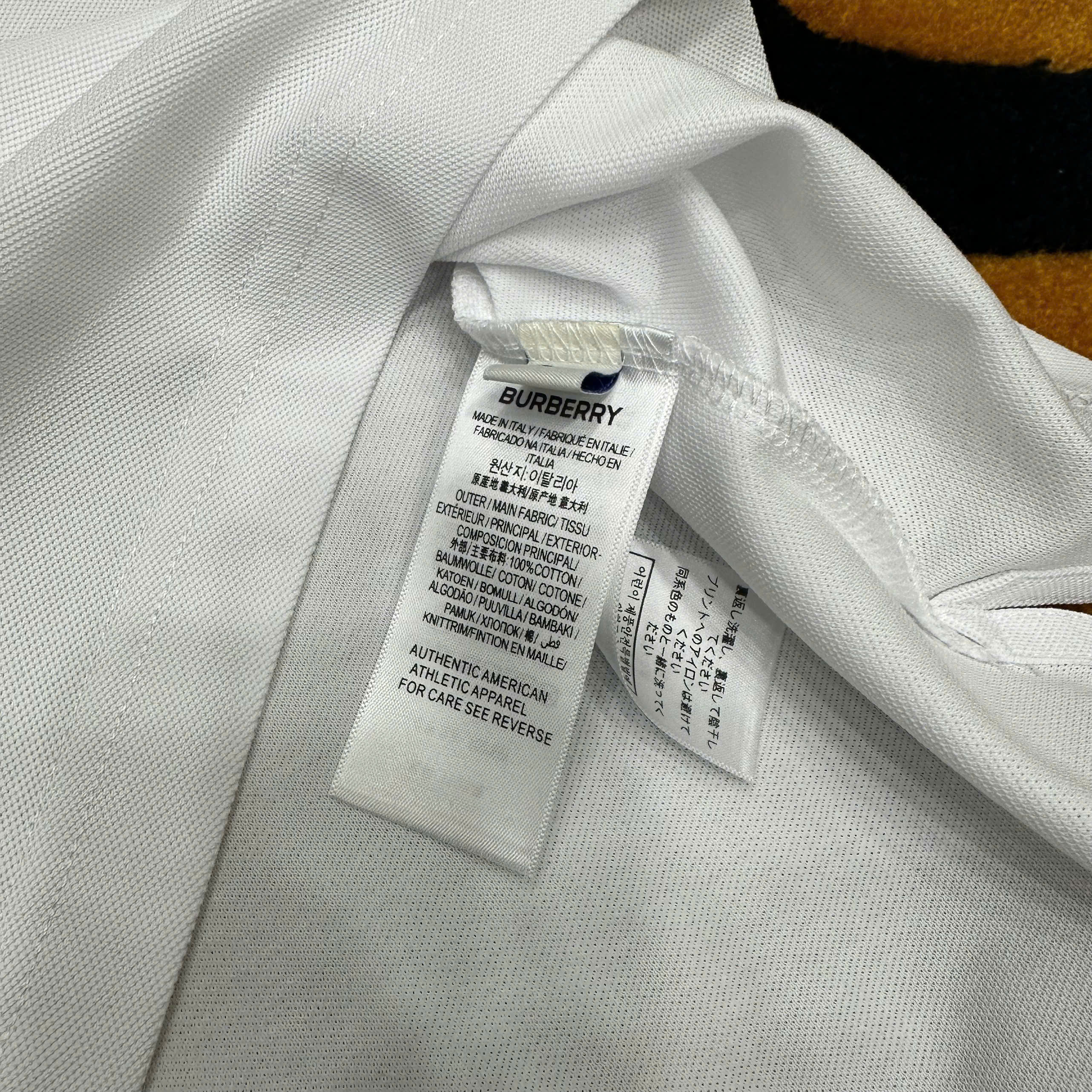 Áo polo Burberry logo thêu ngực phối kẻ sọc cổ tay Nâu Like Auth 1-1 on web MK